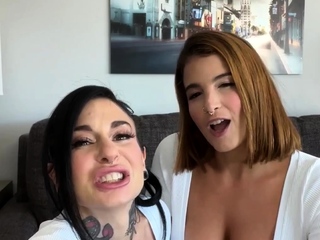 An amateur redhead lesbian is eating pussy from a brunette